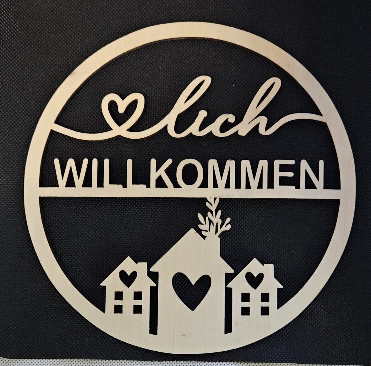 Türschild mit Haus